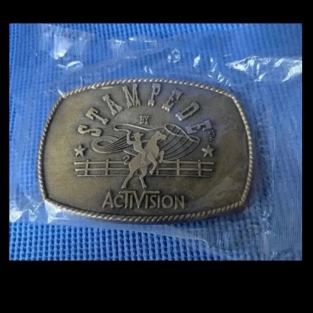 Activision video game BELT BUCKLE STAMPEDE New
Sealed packaging 3”